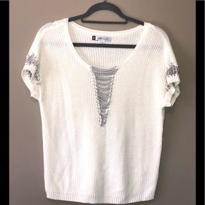 Jennifer Lopez ivory with chains sweater